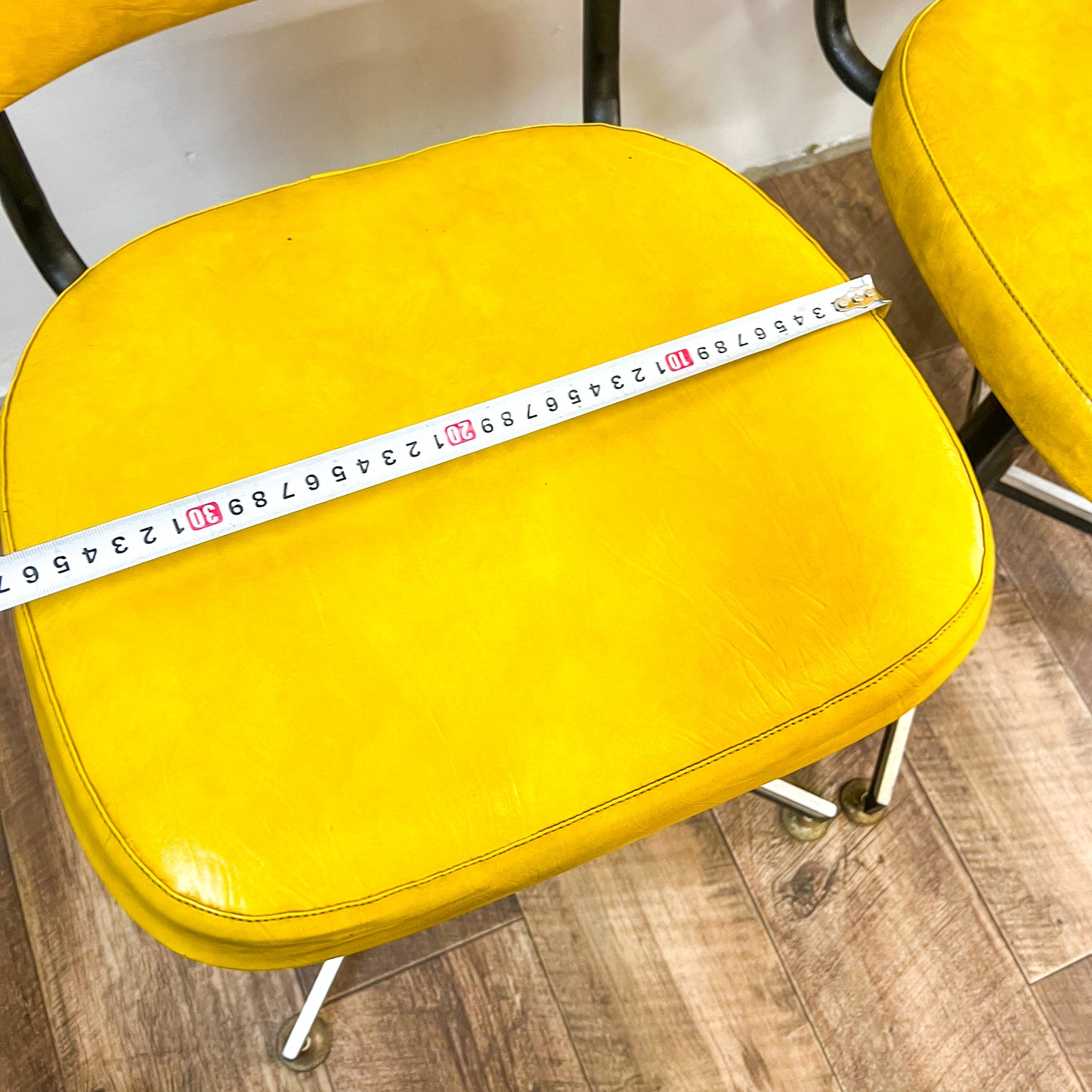 Retro yellow swivel dining chair
