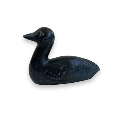 Stone carved duck statue