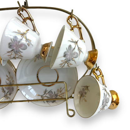 Vintage Japan Tea Cup and Saucer Set with Gold Accents and Floral Design on Brass Rack - 12 Piece Set