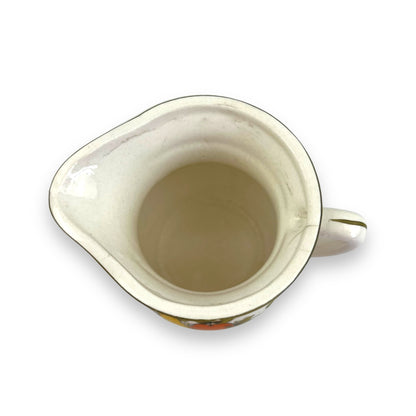 Creamer jug with fruit art