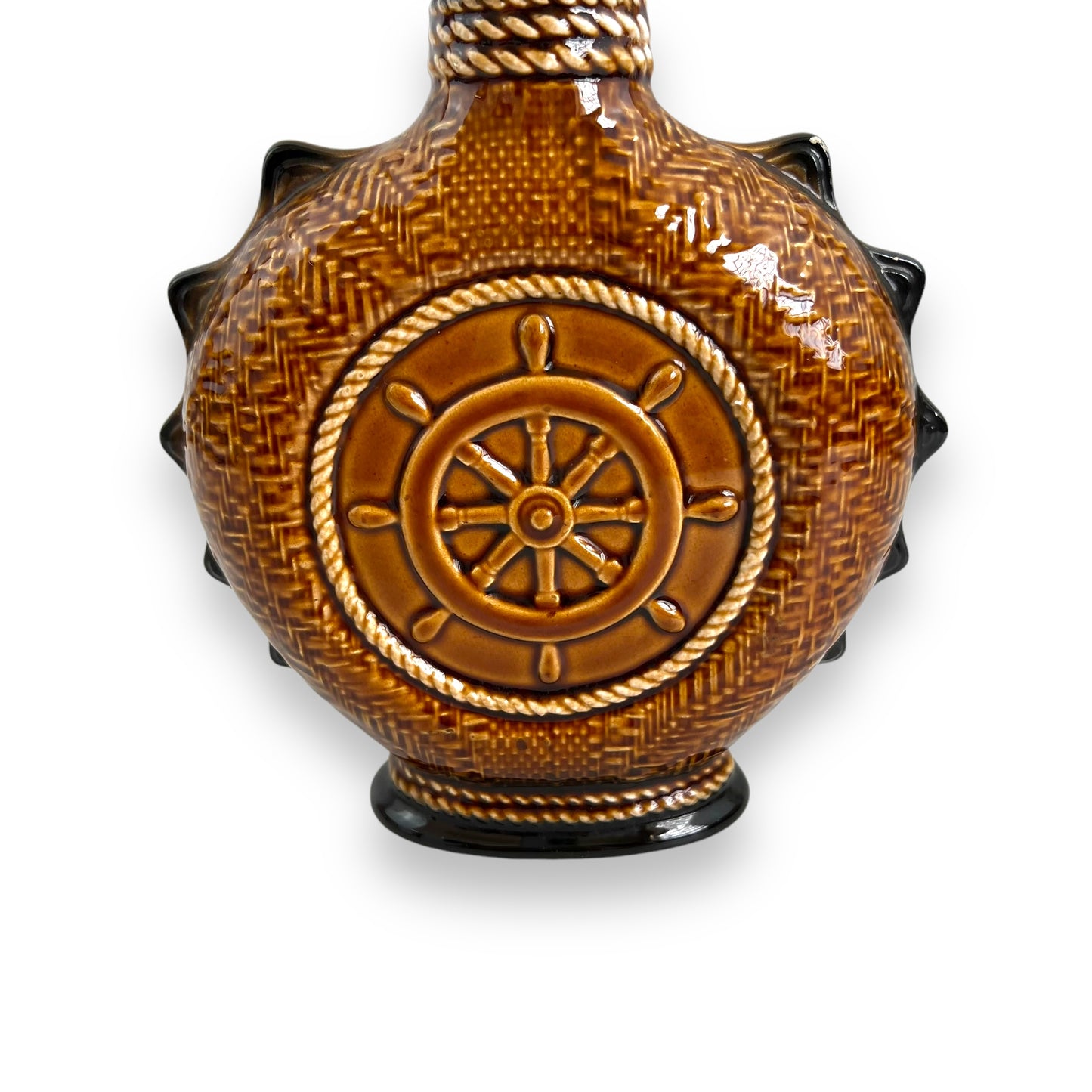 Brown Ceramic Decanter with Ship and wheel design.