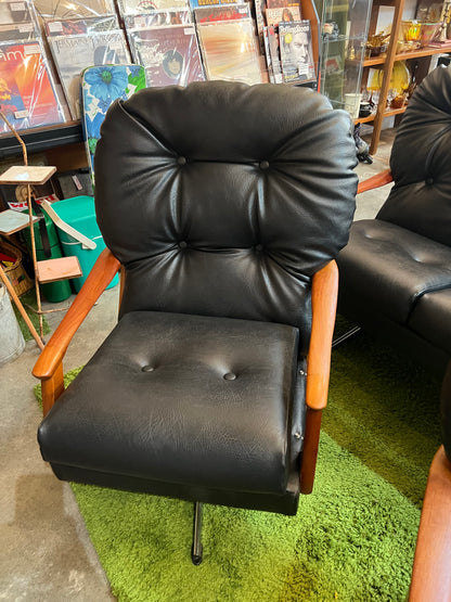 1. Black Vinyl Swivel Armchair with Timber Arms