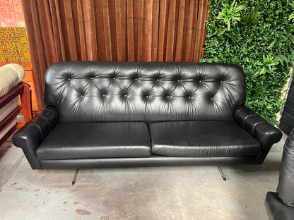 Black Button-Tufted Three-Seater Lounge with Chrome Legs