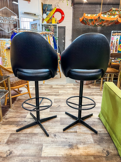 Pair of Black Vinyl Bar Stools with Footrest Base