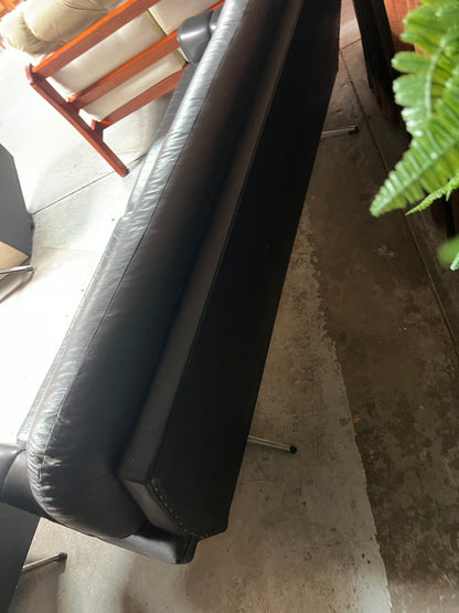 Black Button-Tufted Three-Seater Lounge with Chrome Legs