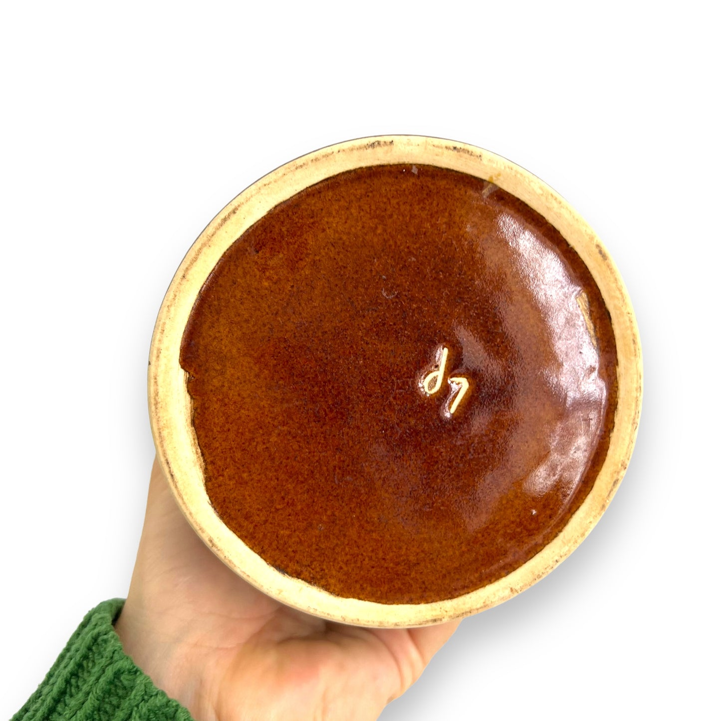 Brown pottery jar with cork lid