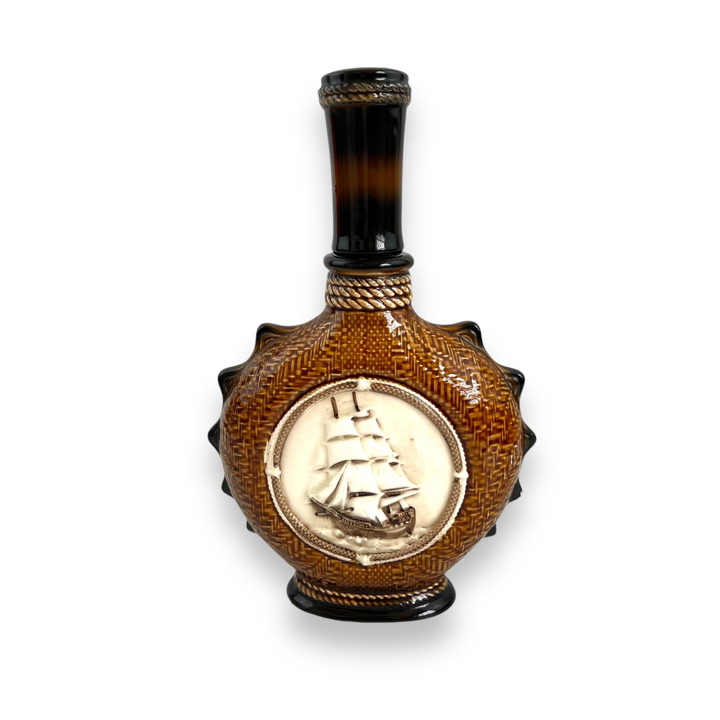 Brown Ceramic Decanter with Ship and wheel design.