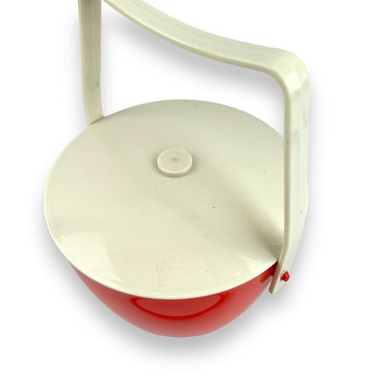 Orange red plastic ice bucket with tongs