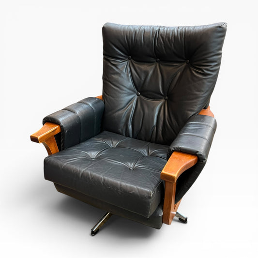 1. Mid-Century Black Leather Swivel Lounge Chair