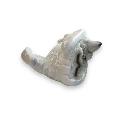 Cat laying on back ornament statue