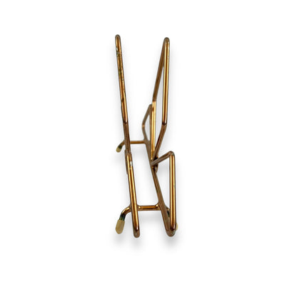 Copper coloured triangle design letter / napkin holder