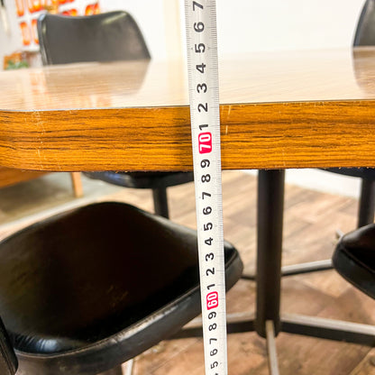 Brown Laminate Octagon Dining Table and 4 Black swivel dining chairs