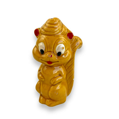 Retro yellow squirrel statue