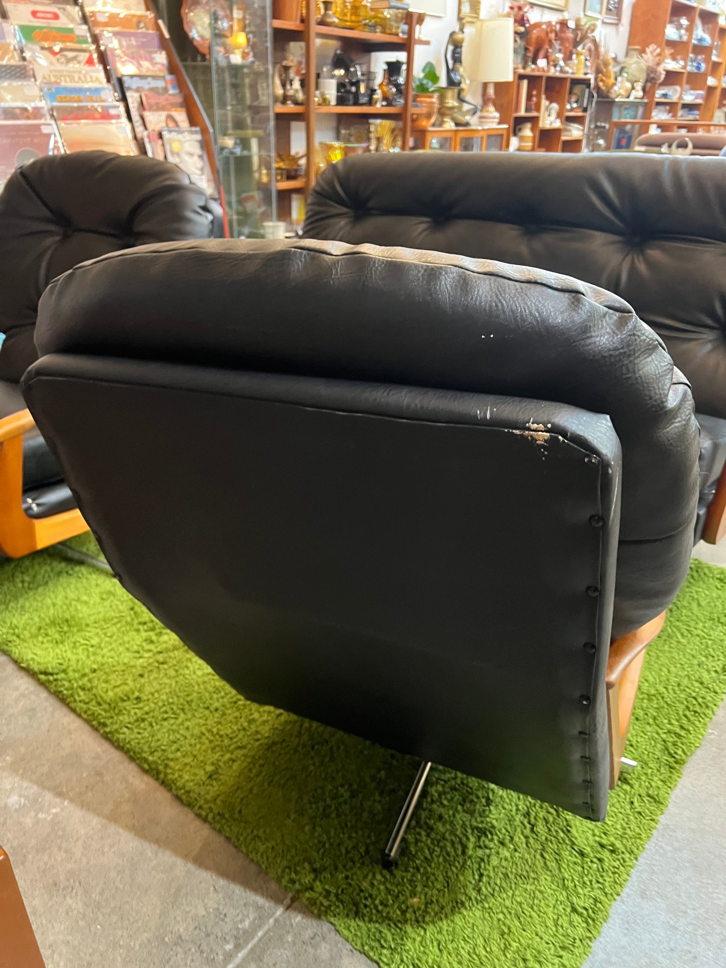 2. Black Vinyl Swivel Armchair with Timber Arms