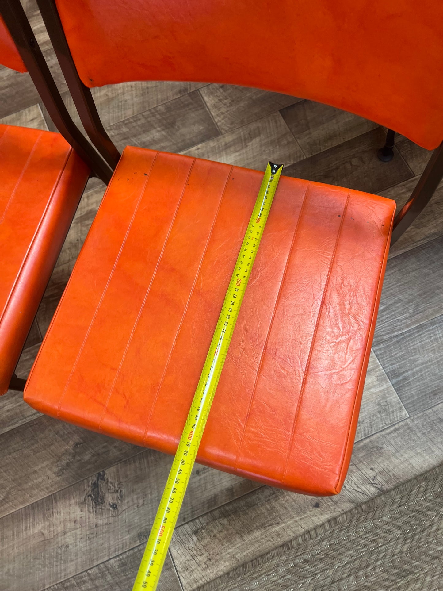 Set of 4 Mid Century Bright Orange Vinyl Dining Chairs with Dark Brown Steel Frames