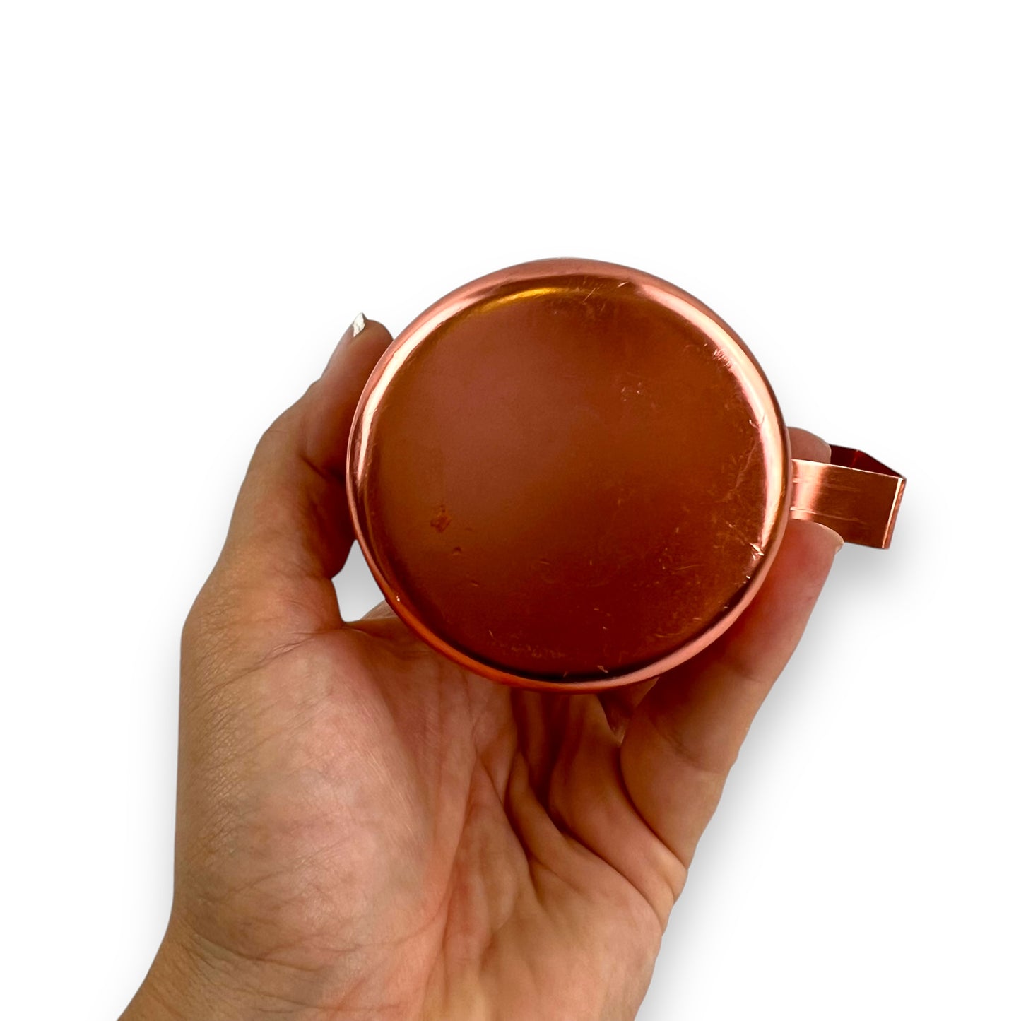 Rose gold coloured metal condiment shaker
