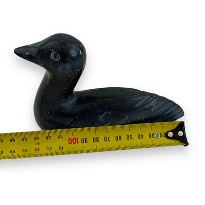 Stone carved duck statue