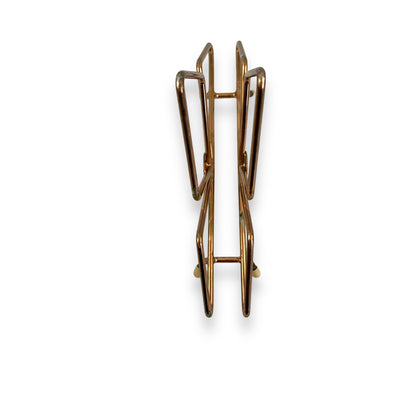 Copper coloured triangle design letter / napkin holder