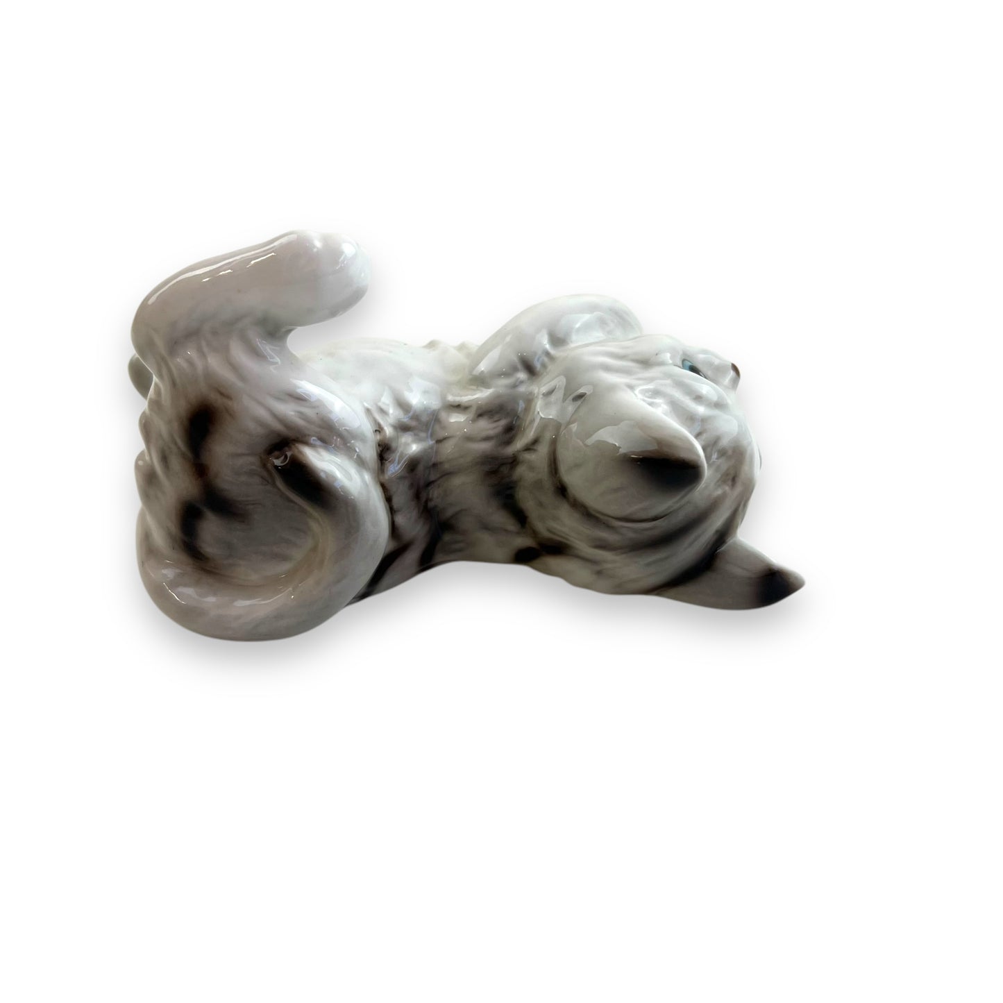 Cat laying on back ornament statue