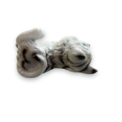Cat laying on back ornament statue