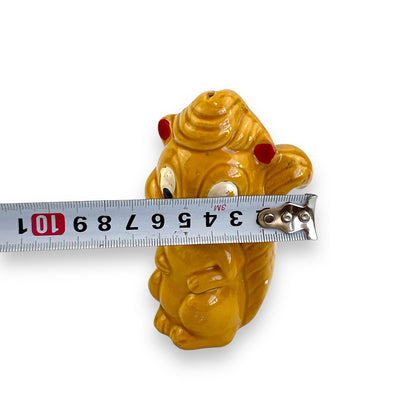 Retro yellow squirrel statue