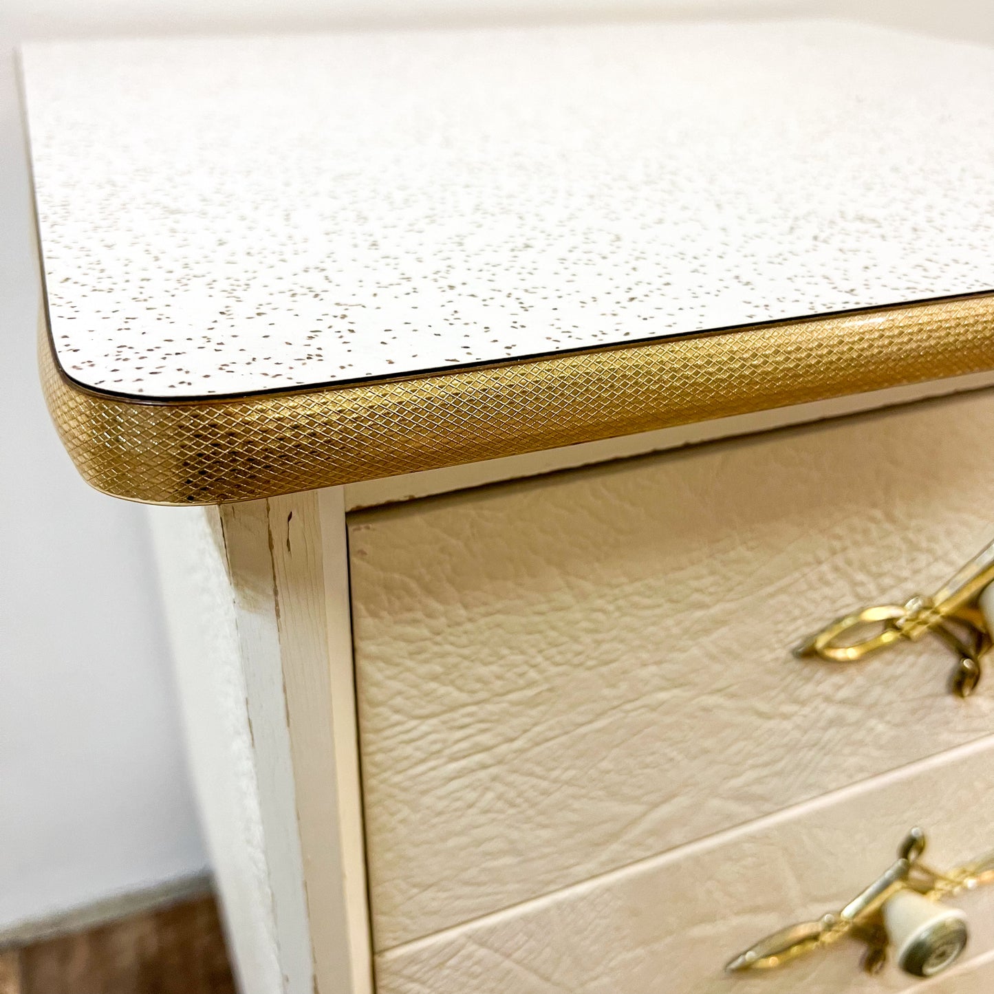 White & gold bedside table
