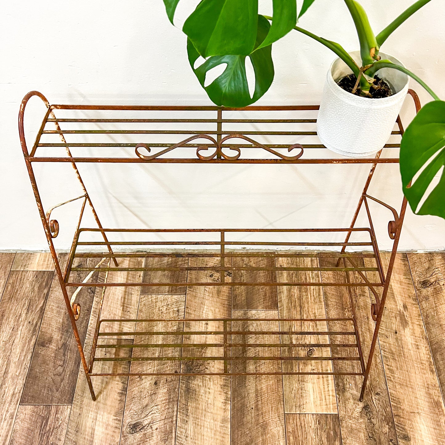 Vintage rusty plant stand