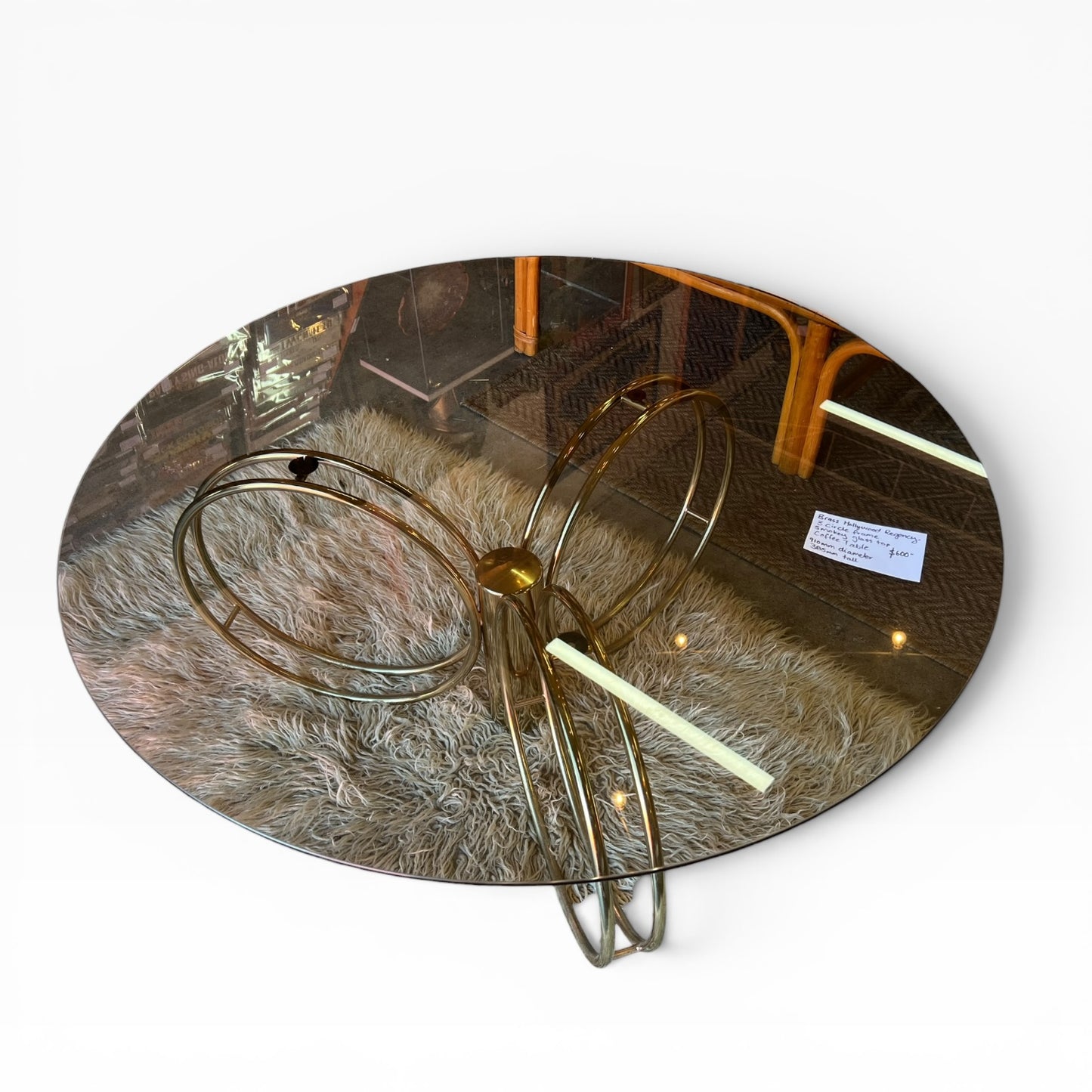 Hollywood Regency Brass & Smoked Glass Coffee Table – Sculptural Triple Ring Base, c.1970s