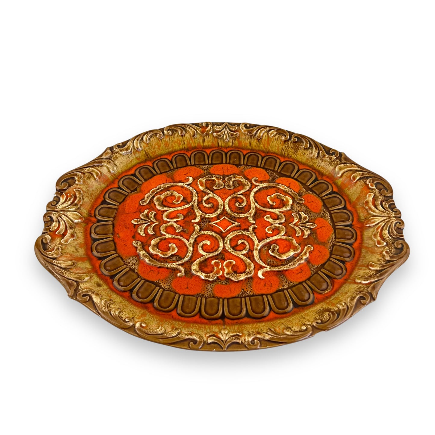 Large orange and brown ornate ceramic serving platter