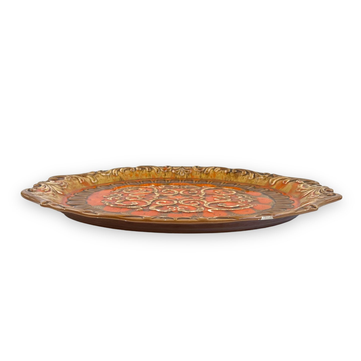 Large orange and brown ornate ceramic serving platter