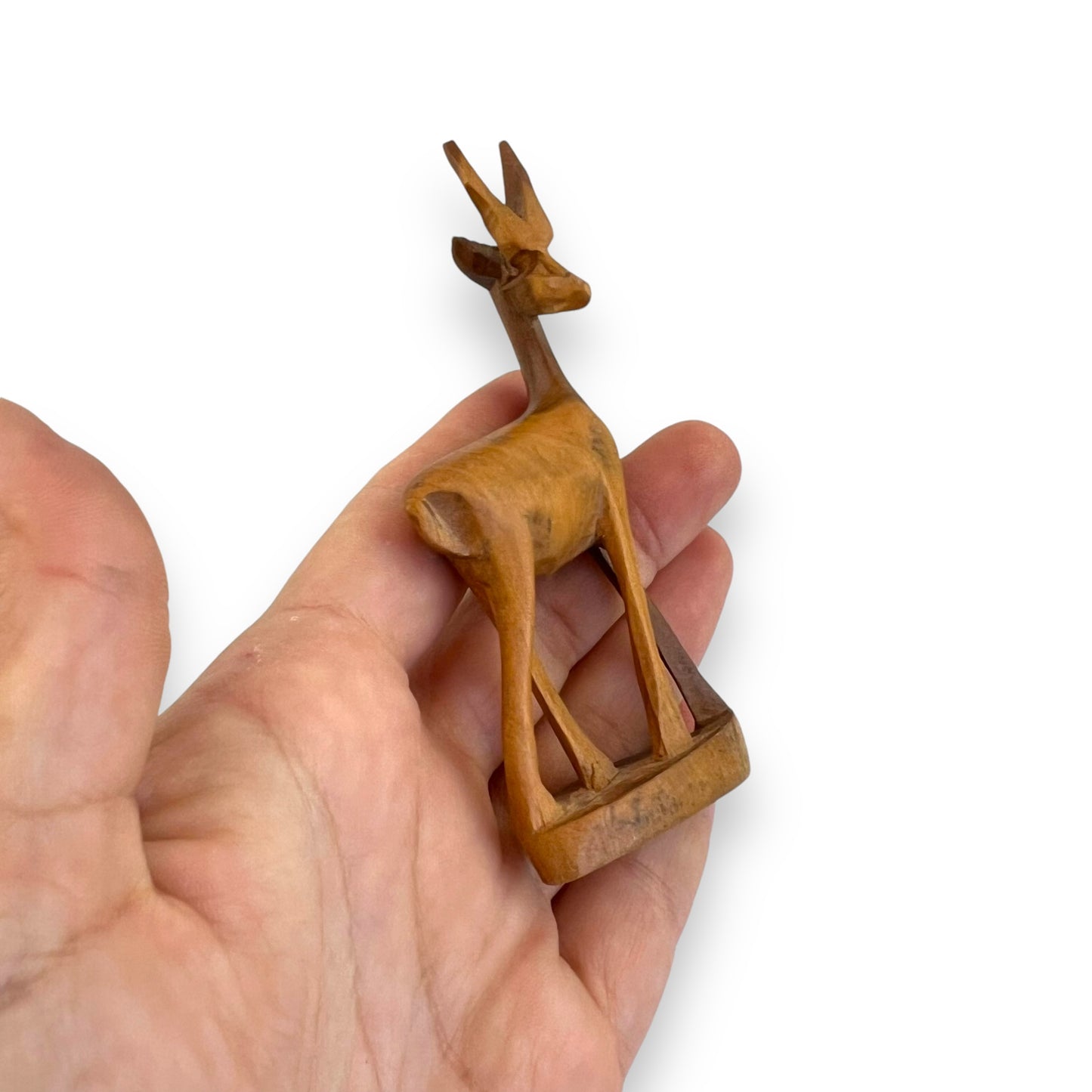 Small wooden antelope carved wooden statue