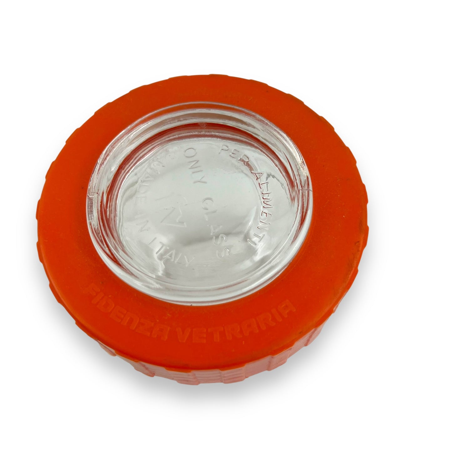 Clear glass jar orange lid