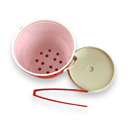 Orange red plastic ice bucket with tongs