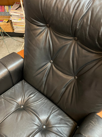 2. Mid-Century Black Leather Swivel Lounge Chair