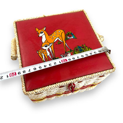 Vintage red and white sewing box with deer artwork