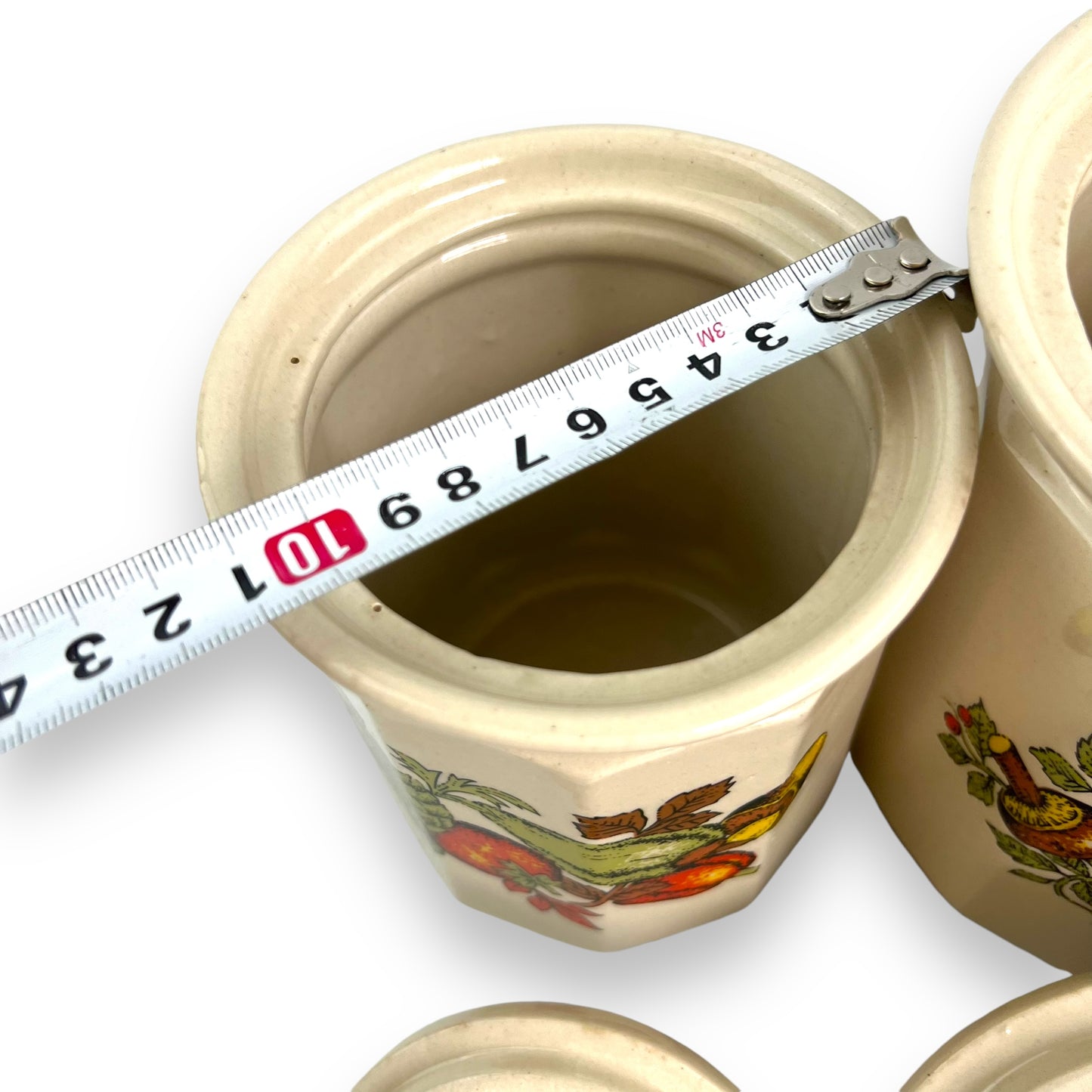 Beige Ceramic Canister set of 3 with colourful vegetable decals.