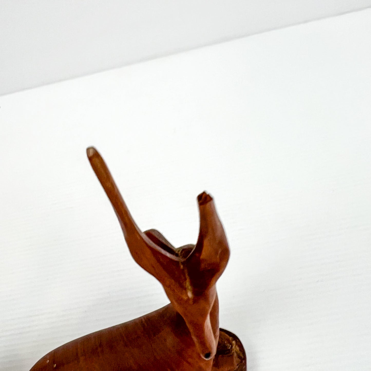 Carved Wooden Laying Antelope Statue Pair