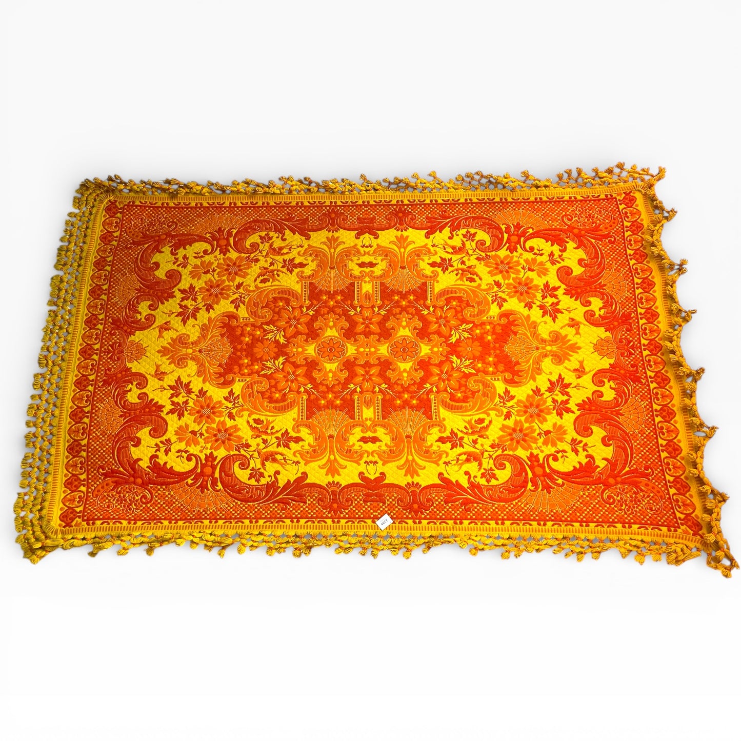 Large orange and yellow patterned wool rug