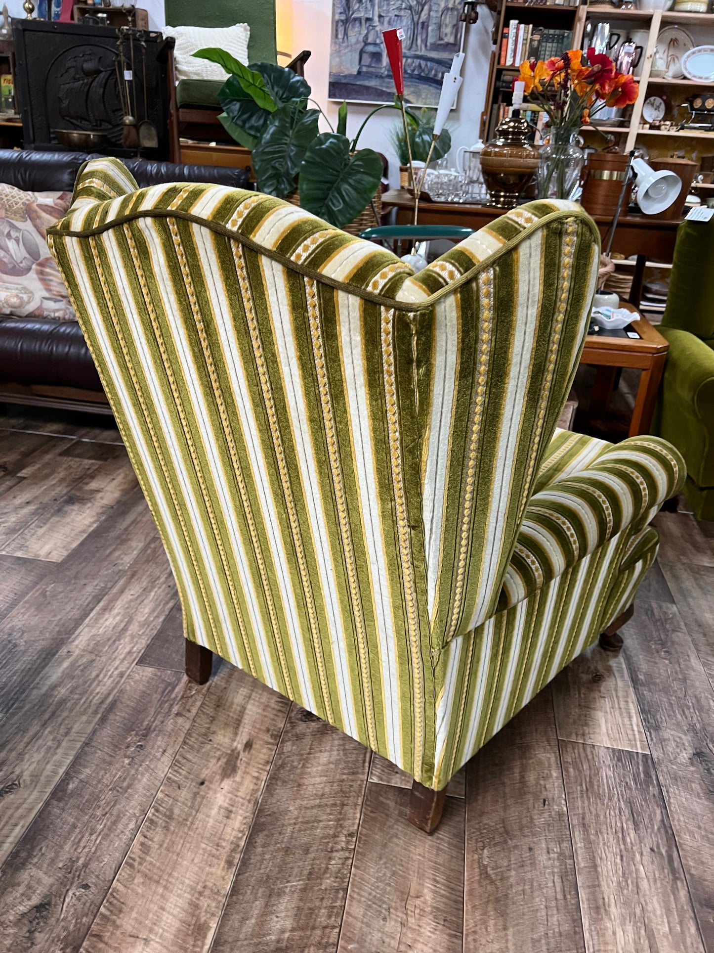 1. Vintage Green Striped Wingback Armchair