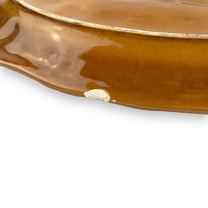 Large orange and brown ornate ceramic serving platter