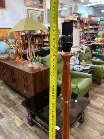 turned timber floor lamp