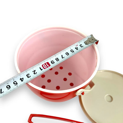 Orange red plastic ice bucket with tongs