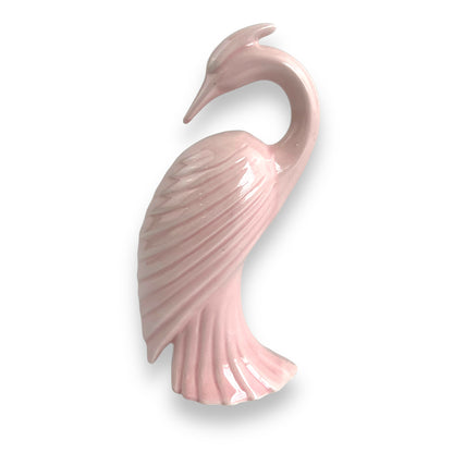 Pink ceramic heron bird statue