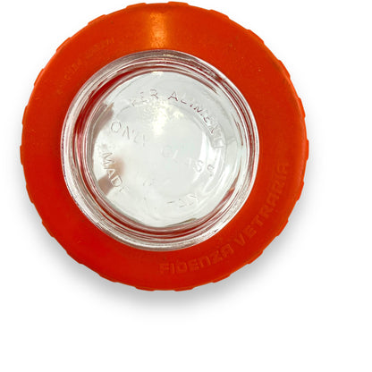Clear glass jar orange lid