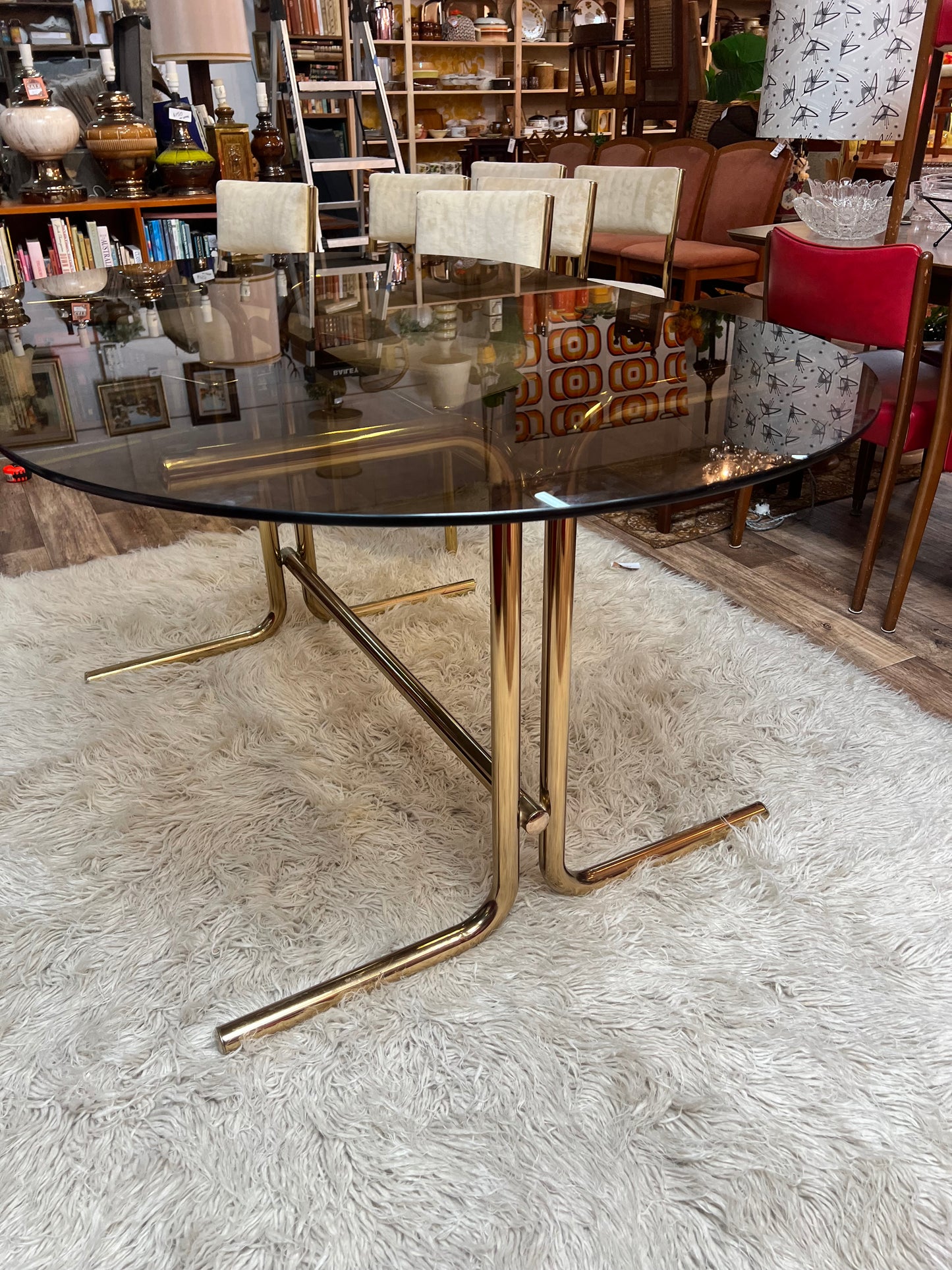 Brass & Smoked Glass Dining Table with 6 Chairs cream upholstery