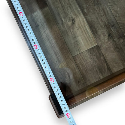 Square wooden frame coffee table with smoky glass top
