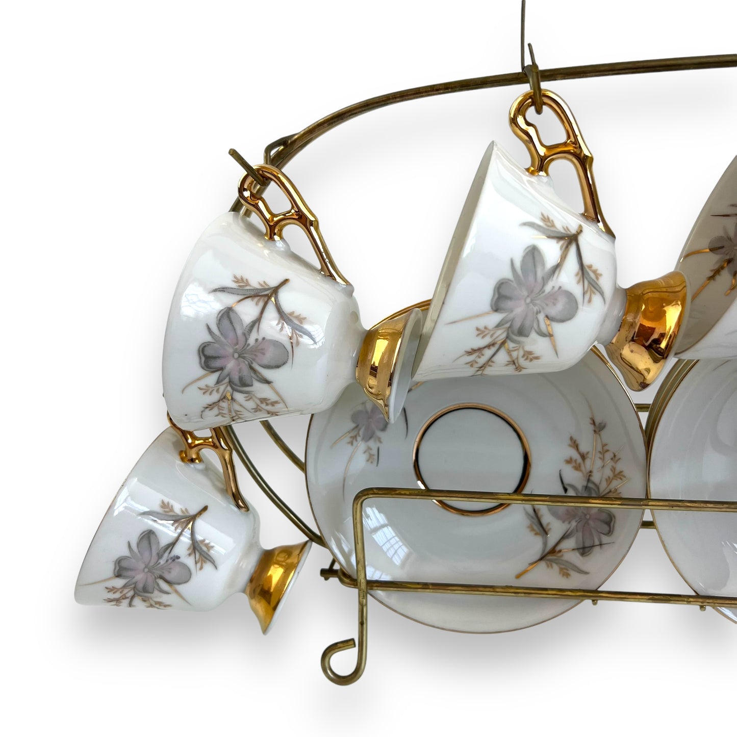 Vintage Japan Tea Cup and Saucer Set with Gold Accents and Floral Design on Brass Rack - 12 Piece Set
