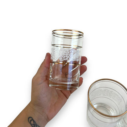 White ornate pattern with gold band glass set of 4