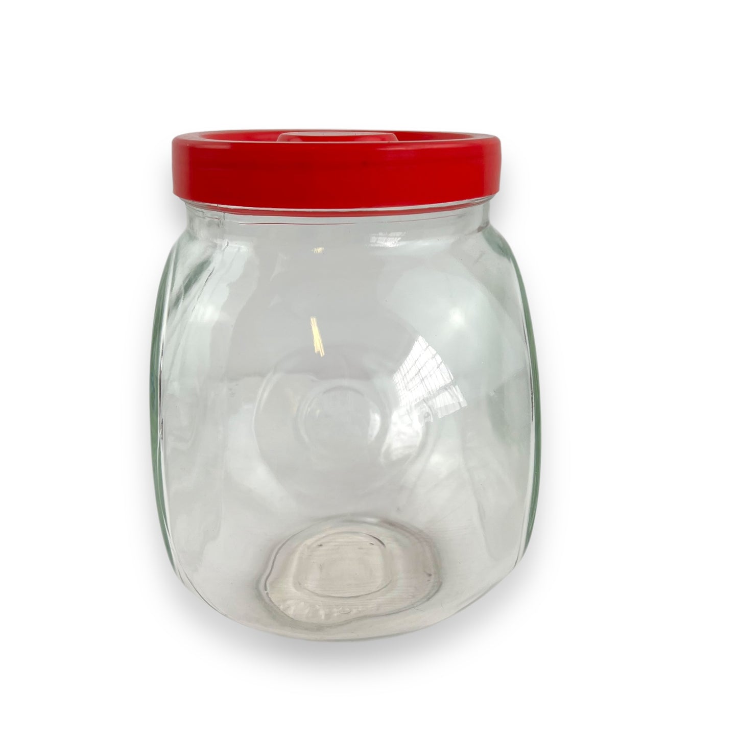 Red lid round glass storage jar