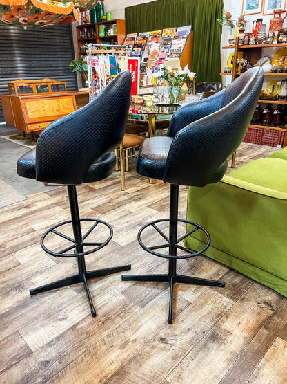 Pair of Black Vinyl Bar Stools with Footrest Base